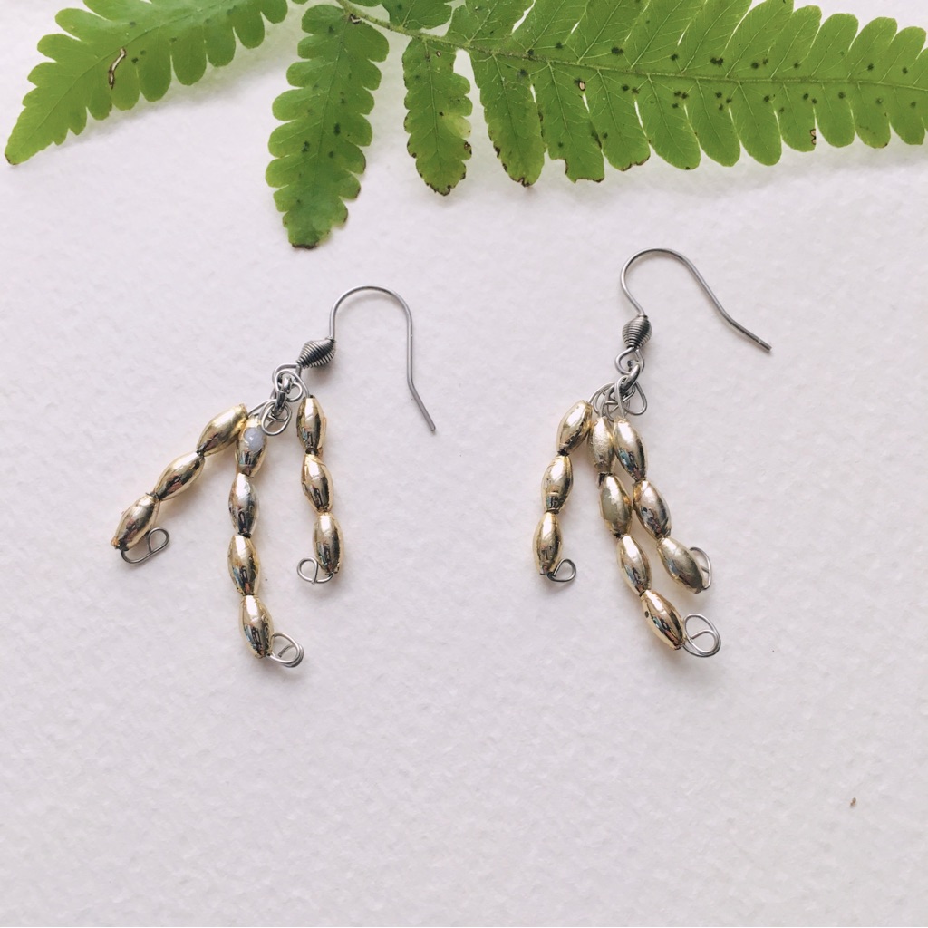Gold Tone Beaded Claw Dangle Earrings
